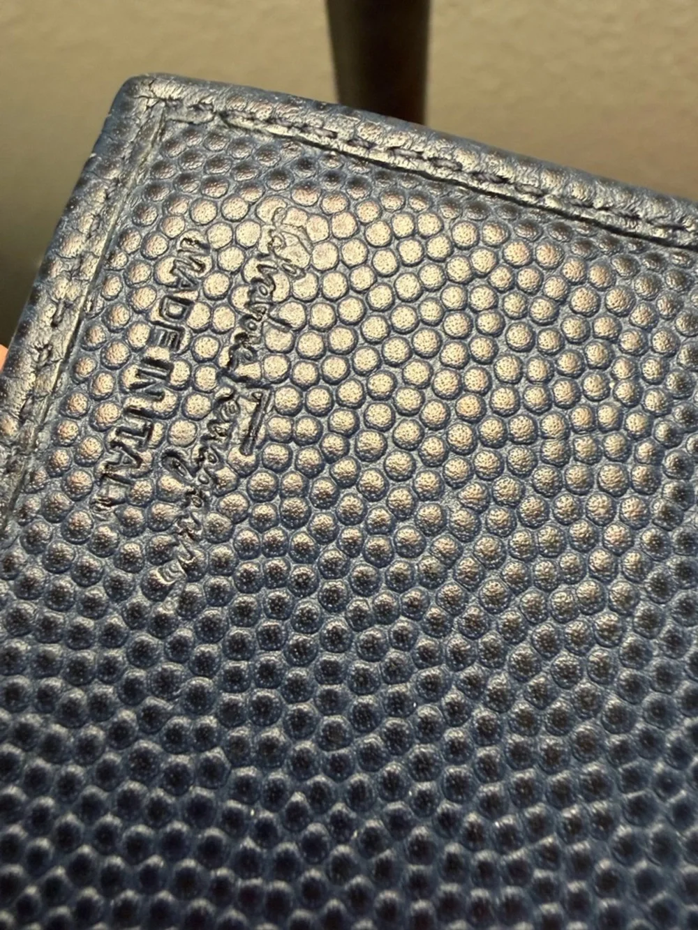 Salvatore Ferragamo men's textured leather bifold wallet with Gancini logo